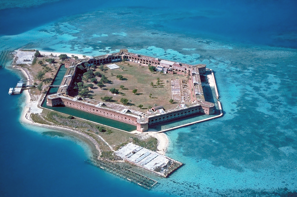 Aerial view of Fort Jefferson surrounded by blue water in Dry Tortugas National Park.