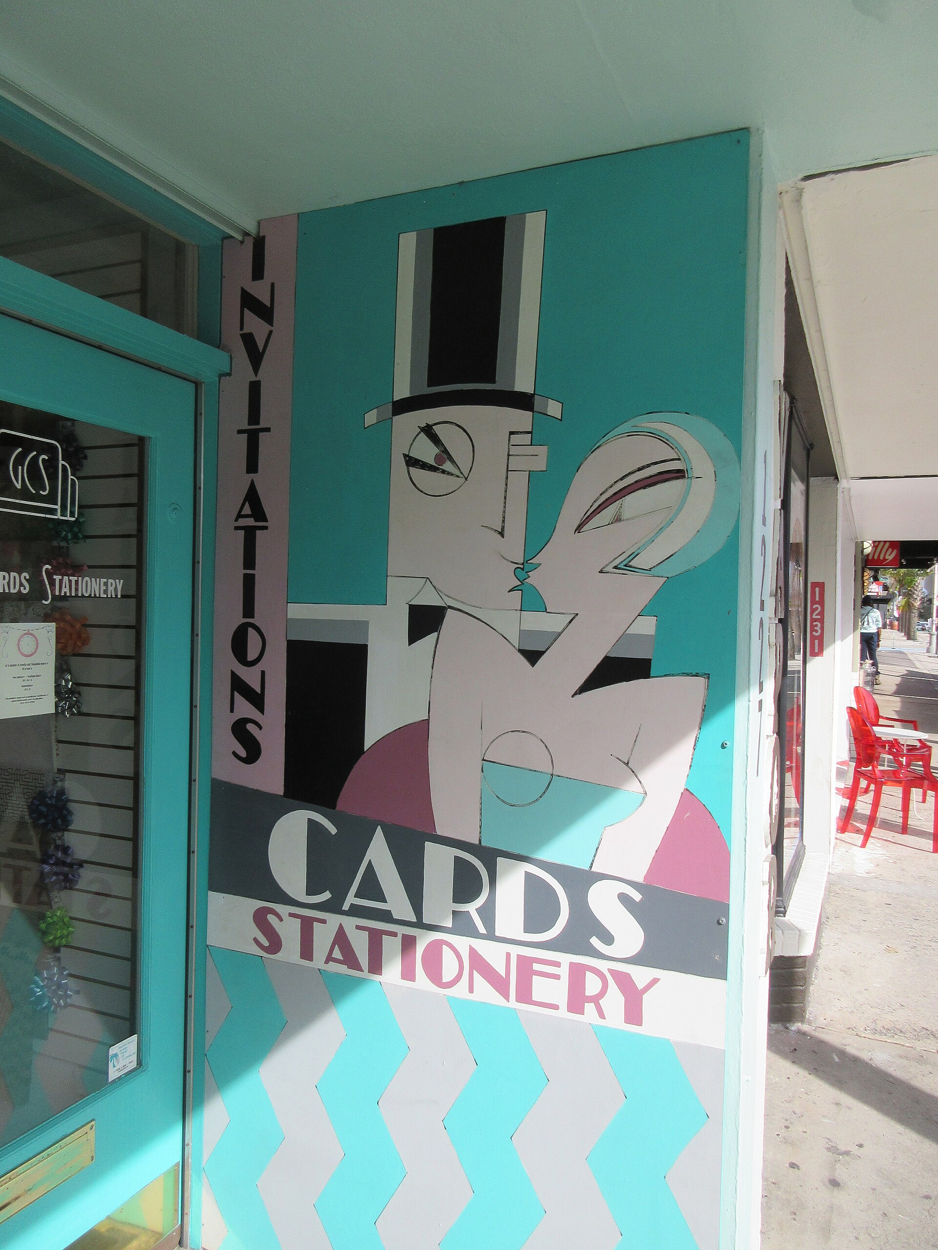 Shops, palms and street life along Las Olas Boulevard in Fort Lauderdale.